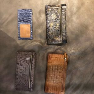 Brahmin wallets.. only one ink mark on one of them. Like new.. 4 pieces
